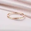Pulseira Transfronteiriça 2023 Versão Coreana Simples e Versátil Titânio Aço Inoxidável Numerais Romanos Vazados Ias Ouro Rosa Estilo Europeu e Americano
