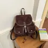 Nova mochila casual de nicho 2026 para mulheres, apresentando um design retrô único, estilo moderno, construção leve e uma estética minimalista, adequada para o trabalho e o deslocamento.