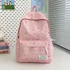 Mochila Ensino Fundamental Meninas Vibe Romântica Bolinhas Laço Versátil Alta Aparência Mochila para Alunas do Ensino Médio