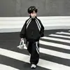 Traje Deportivo para Niños Primavera y Otoño 2026 Nueva Colección de Otoño para Niños Mayores, Sudadera y Pantalones Conjunto Casual de Dos Piezas