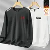 Camiseta de manga larga para hombre para otoño e invierno, marca de moda, corte holgado, forrada de forro polar, engrosada, camiseta básica casual, sudadera de cuello redondo para estudiantes jóvenes