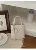 Bolsos de Diseño de Nicho para Mujer 2026 Nuevo Bolso Cruzado Versátil de Verano Bolso de Mano Súper Popular Bolso Cuadrado Pequeño para el Trabajo
