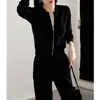 Nuevo Estilo Primavera Temprana 2026 Suéter Negro de Punto de Manga Larga con Cuello Redondo para Mujer, Casual y Versátil, Chaqueta Elegante y que Reduce la Edad
