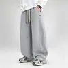 Pantalones deportivos de algodón para niños con dobladillo curvo de otoño, pantalones de pierna ancha para niños, pantalones deportivos casuales holgados estilo coreano para niños mayores, ropa para niños
