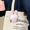 Colgante de Felpa de Conejo a Cuadros Fresco Decoración de Mochila de Dibujos Animados para Estudiantes Llavero de Bolsa de Pareja Regalo Pequeño Venta al por Mayor