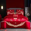 Conjunto de cama de noiva novo estilo chinês 100S, vermelho vibrante bordado, feito de algodão puro, um conjunto de quatro peças, perfeito como presente de casamento para recém-casados