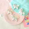 Novedad de Primavera Tela Creativa de Algodón y Lino Caballo Creativo Versátil DIY Accesorio para el Cabello Broche Decoración Colgante para el Año del Caballo