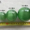Venta al por mayor de fábrica de adornos coloridos de ojo de gato, adornos para sala de estar, juego de balonmano, piedra de ojo de gato, bola de cristal, bola de Feng Shui