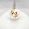Anel Cajia Zircônia Ouro Rosa Anéis de Casal Aço Titânio Anel de Diamante Dourado Fábrica Atacado Estilo Casal Moderno para o Dia a Dia
