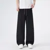 Ropa para Hombre Xintang 2026 Nuevo Lyocell Corte Holgado Versátil de Marca de Moda Pantalones Casuales con Diseño de Caída Pierna Ancha Pantalones Largos