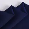 Spot de fábrica tela crepe lisa de alta elasticidad, tela de gasa lisa, tela para vestidos, camisas, ropa de primavera y verano