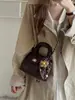 Bolso de mano de cadena con patrón de rombos estilo coreano para mujer, nuevo bolso de hombro retro de moda 2026, bolso cruzado versátil y moderno