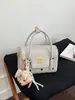 Bolsa transversal 2026 nova, casual, moderna, simples, de nicho, para mulheres, bolsa de ombro, bolsa de mão fashion, bolsa pequena quadrada