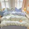 Juego de ropa de cama lindo de dibujos animados con ojos grandes, serie simple lavable de cuatro piezas