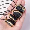 Colgante de oro con piedra de turmalina negra natural transfronteriza, piedra de cristal, cuerda de cuero irregular, collar, joyería, colgante al por mayor