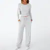 Conjunto Casual Duas Peças para Mulheres - Top Simples de Cor Sólida com Mangas Longas e Calça de Perna Larga com Bolsos - Cruzamento Europeu e Americano 2026