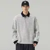 Nueva Colección Otoño/Invierno 2026: Sudadera de rayas con cuello para hombre, de corte holgado y cómodo, estilo versátil y estética streetwear americana casual y a la moda