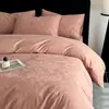 Juego de cuatro piezas de algodón 100% de color liso simple Clase A con funda nórdica de jacquard tridimensional, sábana de algodón puro, ropa de cama de alta gama para dormitorio