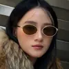 Nuevas Gafas de Sol Metálicas Estilo Hong Kong Ovaladas de Moda Retro Gafas de Sol para Hombres y Mujeres Protector Solar Gafas de Sol para Exteriores Gafas de Sol de Red Transfronteriza