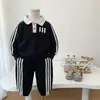 Conjunto de Ropa de Otoño para Niños 2026 Nuevo Estilo Casual para Bebé Conjunto de Dos Piezas Camisa Polo Manga Larga Ropa de Primavera y Otoño para Bebé