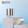 Botella dispensadora redonda de vidrio de boca alta de 50 g Crema para dama Mascarilla de noche Crema Botella dispensadora de vidrio