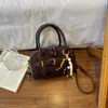 Shuai Mi Home 2026 Outono Novo Bolsa de Mão Boston Fashionável e Estilosa Simples Grande Capacidade Bolsa de Ombro de Nicho