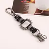 Llavero de cuero genuino elegante europeo y americano colgante de llave de joyería vintage punk joyería de productos pequeños de Yiwu venta al por mayor