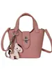 Bolso de mano cruzado exquisito para mujer, nuevo modelo 2026, bolso de mano pequeño súper popular para el trabajo, bolso de cubo de alta gama para hombro y cruzado