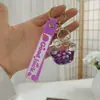 Llavero de Botella de Arena Líquida de Dibujos Animados, Pequeños Regalos para Puestos, Accesorios Acrílicos al por Mayor, Colgante Relleno de Aceite, Rasca Gatos Lindo de Regalo