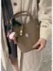 Bolso Bandolera Retro Cesta de Verduras para Mujer Moda Otoño e Invierno 2025 Nuevo Bolso Cubo Texturizado Bolso Cruzado de Alta Gama