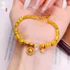 Pulsera de Rueda de Estrella de Diamante Chapada en Oro de Latón Placa de Estrella de Cinco Puntas Lujo Accesible Gama Alta Pulsera de Anillo Corredizo con Cuentas de Transferencia de Oro Arena para Mujeres