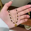 Collar de Cuentas Exquisito Retro Ojo de Tigre Maillard Mariposa Cadena para Clavícula Elegante de Lujo Ligero Nicho Versátil