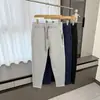 ¡Estilo de pierna cónica! ¡Tejido Toray de capa de aire! Moda masculina otoño e invierno color liso cremallera versátil hoja curva pantalones casuales