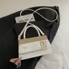 Bolso de Mano Cuadrado Pequeño Texturizado Transfronterizo Otoño 2025 Bolso de Hombro de Lujo Ligero de Alta Gama Bolso Cruzado Versátil de Nicho para Viajes y Uso Diario