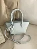 Bolso de Mano de Moda de Alta Gama 2026 Nuevo Modelo Bolso de Hombro Versátil Simple para el Trabajo Bolso Tote Cruzado Casual