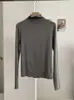 KEKEZOON Camiseta de manga larga ajustada de color liso con cuello semialto y volantes, hombro normal, prenda básica para mujer 8705