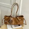 Bolsa de mano casual de gran capacidad transfronteriza para mujer, nuevo estilo 2026, bolso de hombro simple para el día a día, estilo coreano, relajado y chic, bolso de axila