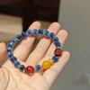 Pulsera de corazón azul estilo nacional Ágata Perla pulsera con colgante de hebilla de seguridad de ágata de fuente de sal joyería al por mayor
