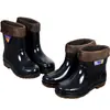 Botas de lluvia duraderas con suela de goma para hombres y mujeres, cálidas, resistentes a ácidos y álcalis, de tubo corto, engrosadas, protección laboral, impermeables, botas de lluvia de tubo medio de moda para hombre