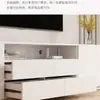 Móvel de TV minimalista moderno para sala de estar, apartamento pequeno, combinação de mesa de centro e móvel de TV de piso estilo creme