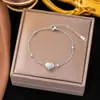 Collar de Lujo Accesible de Nicho Casual y Exquisito Collar con Colgante de Corazón Pequeño Cadena para Clavícula de Acero de Titanio Dorado de 18 Quilates que No se Desvanece para Mujeres