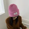 Al por mayor 25 Años Otoño e Invierno Nuevo de Alta Calidad Color Sólido Parche Circunferencia de Cabeza Grande Gorro de Punto Casual Cálido y a Prueba de Frío Gorro de Lana