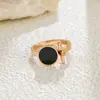 Anillos Redondos Negros Estilo Coreano y Japonés, Accesorios de Moda Personalizados de Acero de Titanio, Anillos de Celebridad de Internet que No se Desvanecen, Venta al por Mayor de Fábrica en Stock