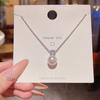 Collar de acero de titanio ligero de lujo de estilo japonés y coreano para mujer, colgante de circonita con microincrustaciones que combina con todo, cadena de clavícula con lazo estilo Ins, venta al por mayor