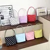 Bolsa feminina é super popular e versátil, uma bolsa de nylon de bolinhas de nicho para mulheres, nova bolsa versátil 2026, bolsa de ombro e de axila feminina