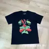 Travis Scott 26Ss Nuevo Estilo de Verano Calle Alta Americana Manga Corta Holgada Casual Nicho Camisetas Tops para Hombre y Mujer