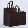 Bolsa no tejida al por mayor personalizada bolsa de compras publicitaria bolsa en blanco para empaque de ropa impresión bolso promocional en stock