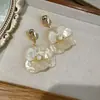 Pendientes de flores de gardenia estilo bosque francés retro con dulce temperamento de nicho de alto sentido, joyería para las orejas estilo festivo