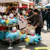 Suministros para vendedores ambulantes: carritos de juguete para niños, globos de papel de aluminio, juguetes de dibujos animados para niños con ruedas, para mercados nocturnos de plaza y decoraciones de fiesta de cumpleaños