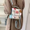 Mochila nova de ombro duplo estilo nicho com laço para meninas, fofa, outono, bolsa de mão, ombro único, desenho animado, moderna, 2026